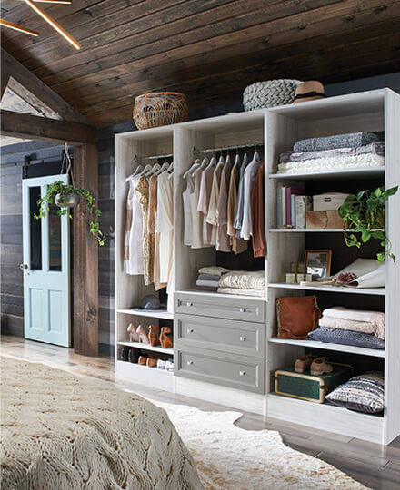 Wood Shelving and Drawers in Bedroom Closet