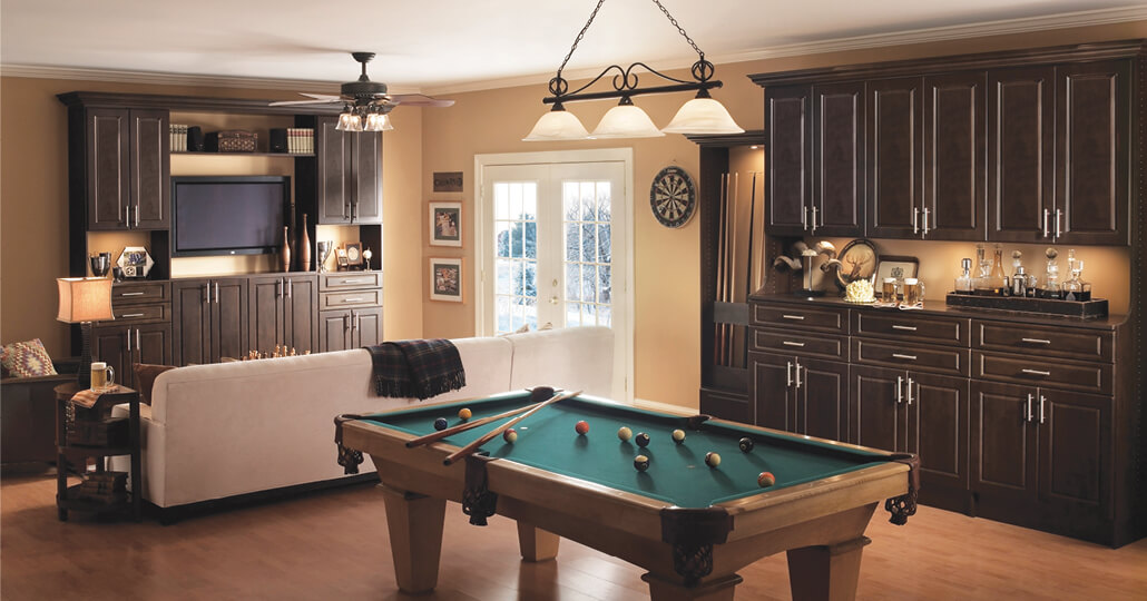 Call it a game room or a man cave. Its name doesn’t matter. What does matter is how it looks and how it functions. Build out separate areas for different purposes and leave precious floor space for playing or entertaining.  Find your solution.
